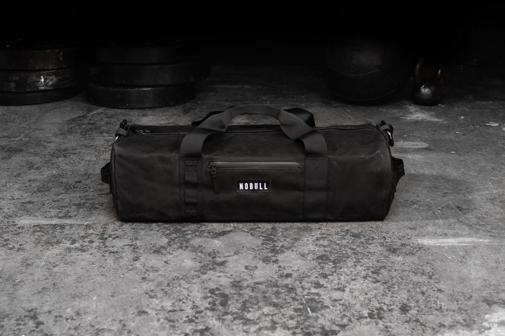 WAXED CANVAS TRADITIONAL DUFFLE - BLACK